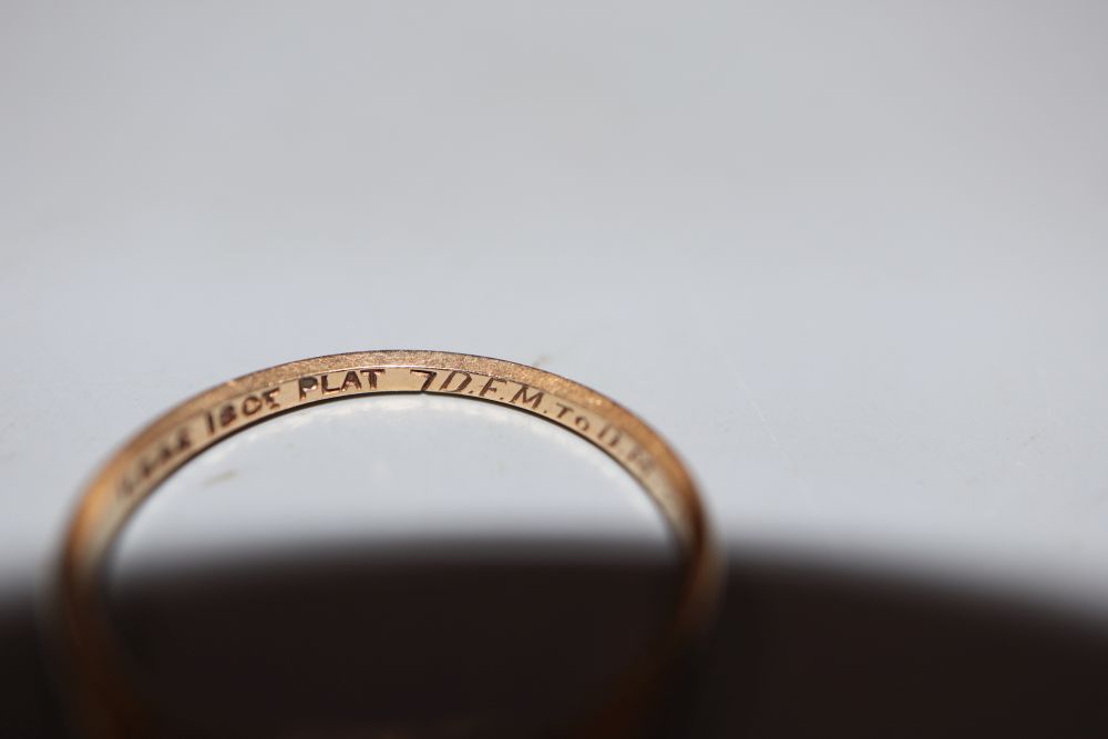 A 1930s 18ct and plat three stone diamond ring, size M, gross 1.7 grams.